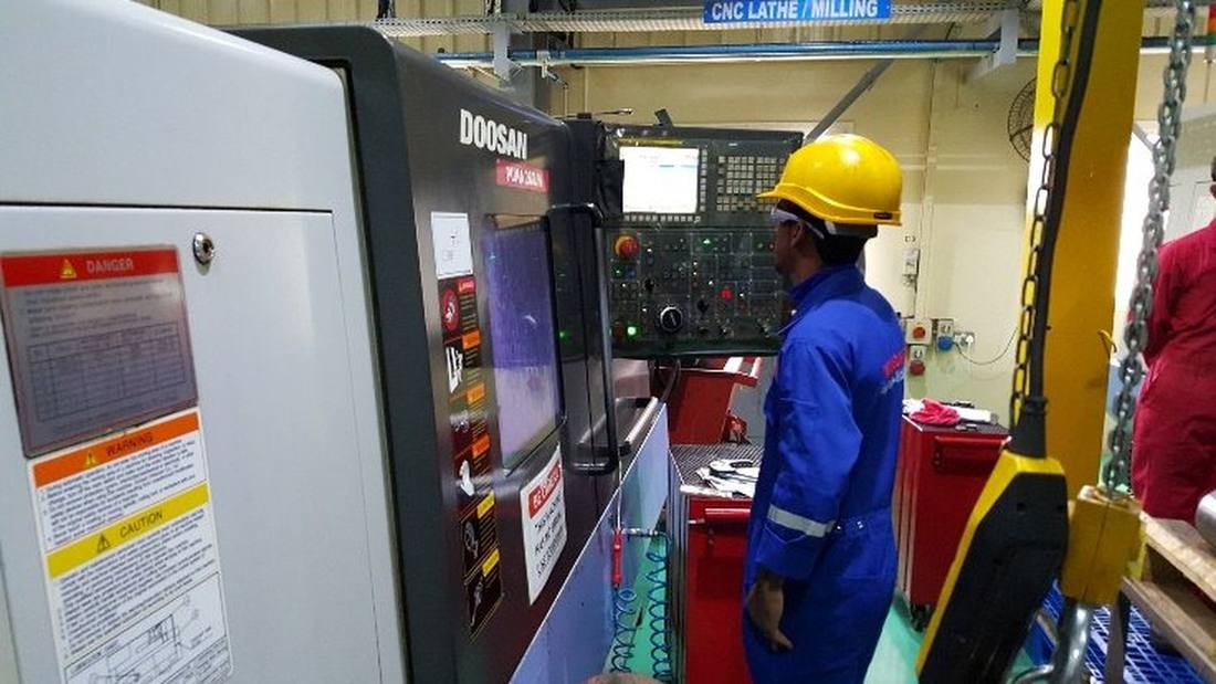 Vanguard machinist operating a CNC machine
